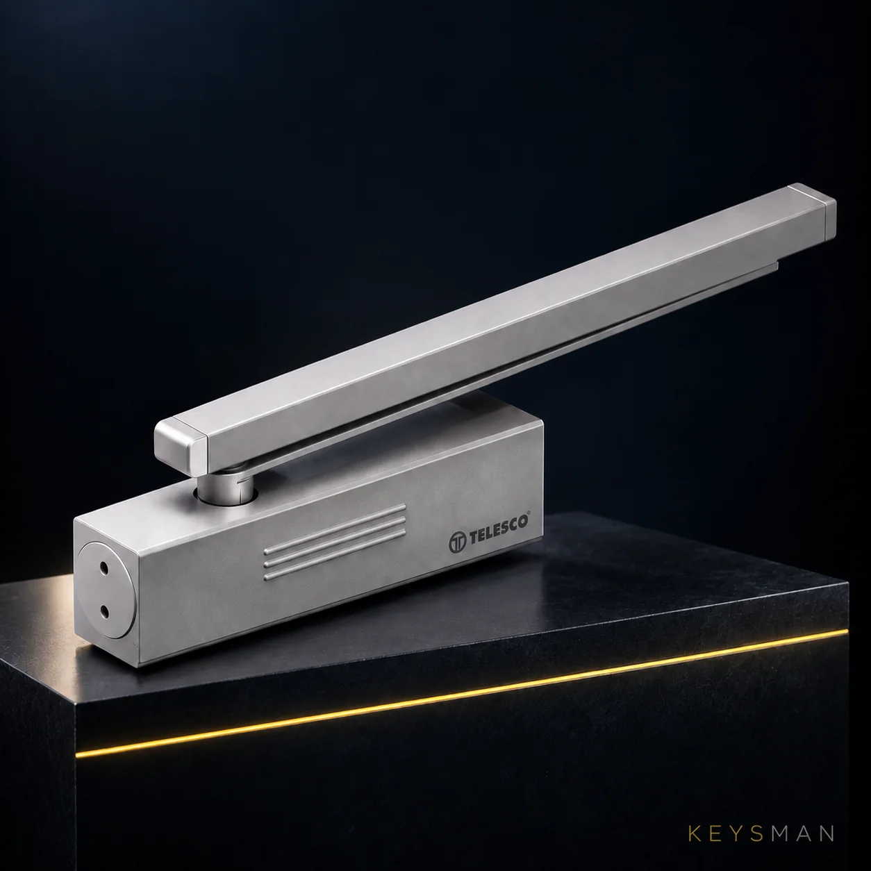 Cierrapuertas Telesco sobre pedestal oscuro para Keysman Mallorca